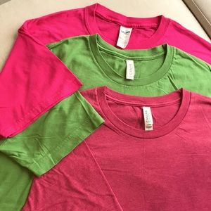 Get out and get dirty! Three 100% cotton Tees in spring colors. NWOT.